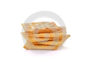 Saltine cracker on white background