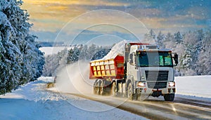 Salting highway maintenance. Snow plow truck on snowy road in action. Hard weather condition