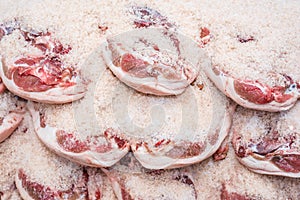Salting process of iberian ham. Meat industry concept. photo