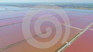 The saltpan Saline stretches Margherita di Savoia Apulia City Sea Coastline sed water in Italy Drone flight