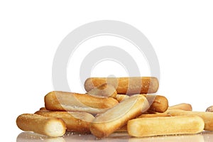 Salty bread sticks on white background