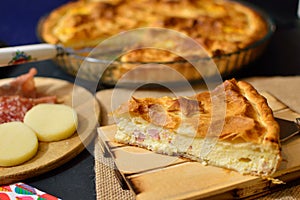 Salty cake with homemade cheese and ham