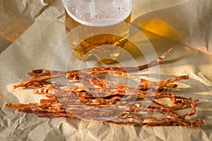 salty spicy fish sticks to beer. tasty beer snack. dried fish.