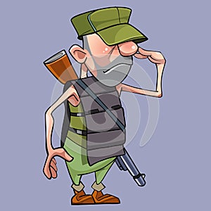 Salutes cartoon male soldier in a armored vest with a gun photo