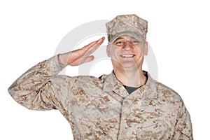 Saluting and smiling army soldier studio shoot