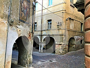 Saluzzo town, Piedmont region, Italy. Art, history, arches and splendid ancient alley