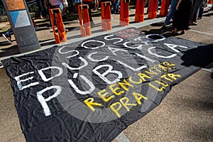 Brazilians protest with banners against money cuts in Brazilian education by President Jair Bolsonaro in the city of Salvador,