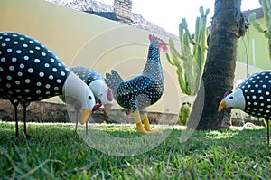 Angola chicken statue photo