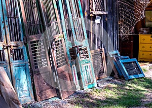 Salvage yard with many doors and windows photo