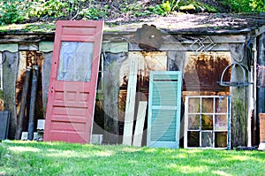 Salvage yard with old doors and windows photo