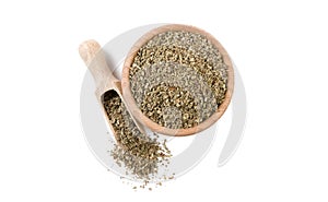 Salvia or sage in wooden bowl and scoop isolated on white background. top view. Spices and food ingredients