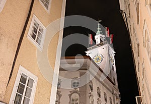 Salzburg, Austria, August 15, 2022. Fascinating night shot of the town hall clock tower.