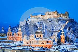 Salzburg, Austria: Winter viewof the historic city of Salzburg with famous Festung Hohensalzburg and Salzach river illuminated in