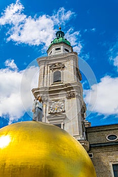 the Salzburg cathedral with the Sphaera sculpture situated on the Kapitelplatz in the central Salzburg, Austria....IMAGE