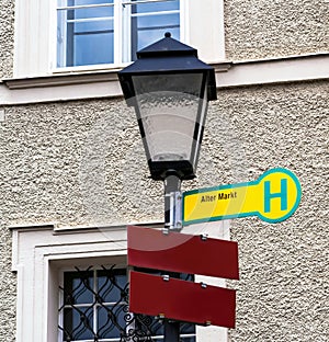 Salzburg. Direction of traffic in German to Alter markt Old market on lamp post