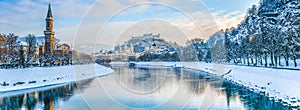 Salzburg skyline with Fortress Hohensalzburg in winter, Austria photo