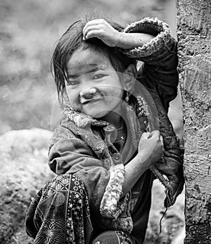 Samagau, Gorkha - December 23 2018: Young beautiful sherpa girl poses infront of the camera