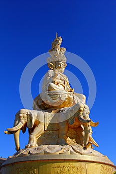 Samantabhadra statue with blue sky