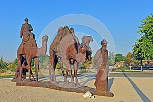 Samarkand: monument to caravan of camels in desert