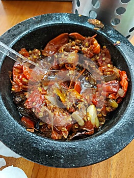 Sambal or sambel korek or setan or pedas or cabai or cabe or traditional hot chilli.