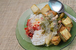 Sambal, sayur asem,tahu kulit dan terong goreng. Makanan khas indonesia photo
