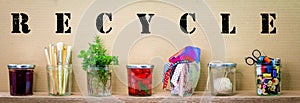 Same jar reused for different contents, recycled text on cardboard background, reduce waste by recycling and reusing