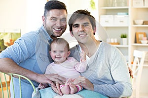 Same sex couple with daughter at home