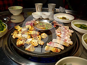 Samgyeopsal, grilled pork belly. Makchang, grilled abomasum, the fourth and final stomach compartment in ruminants of cattle. photo
