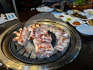 Samgyeopsal, grilled pork belly and Moksal, grilled pork neck popular in South Korea.
