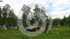 Sami huts in Fatmomake kyrkstad on the Wilderness Road in Vasterbotten, Sweden photo