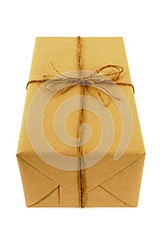 Samll paper parcel or package tied up with string, isolated, vertical