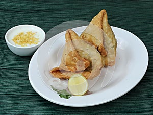 Samosa, stuffed with mixed masala potatoes, Indian special traditional street food also known as punjabi samosa,aloo samosa.served