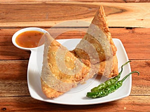 Samosa, stuffed with mixed masala potatoes, Indian special traditional street food also known as punjabi samosa,aloo samosa.served