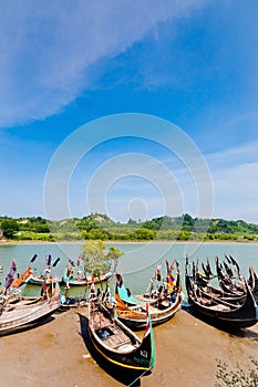 Sampan boats and the green mountain