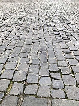 Sampietrini stone paved square in Rome