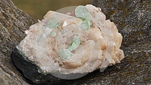 Sample of apophyllite and stilbite on a black background