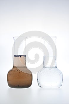 Sample of clean and dirty water photo