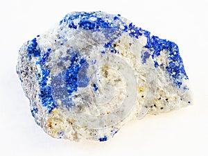 sample of lazurite (lapis lazuli) stone on white