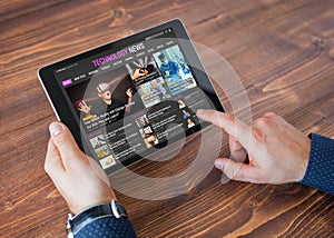 Sample tech news website on tablet