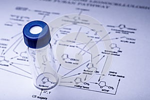 Sample vial on the paper