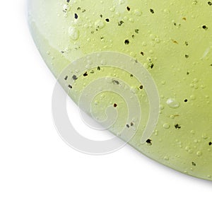 Sample of yellow shower gel on white background, closeup