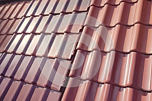 Samples of ceramic roofing tiles in a warehouse of a roofing mat