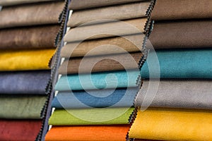 Samples colored upholstery furniture fabrics closeup photo