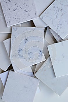 Samples of different stones mainly white based with marble like grains and veins