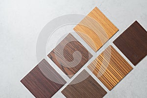 Samples of material, wood , on concrete table.Interior design se