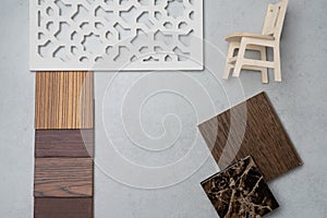 Samples of material, wood , on concrete table.Interior design se