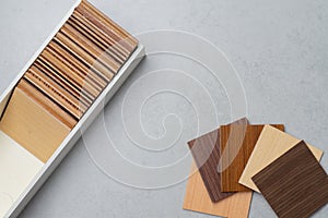 Samples of material, wood , on concrete table.Interior design se