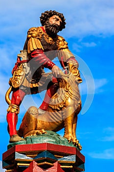 Samson fountain (Simsonbrunnen) on Kramgasse in the Old City of Bern, Switzerland. Built in 1544 by Hans Gieng