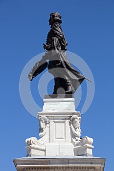 Samuel de Champlain against a blue sky
