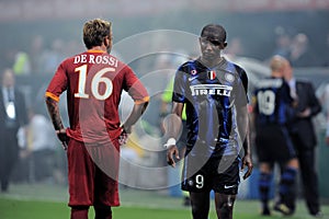 Samuel Eto`o and Daniele De Rossi during the match